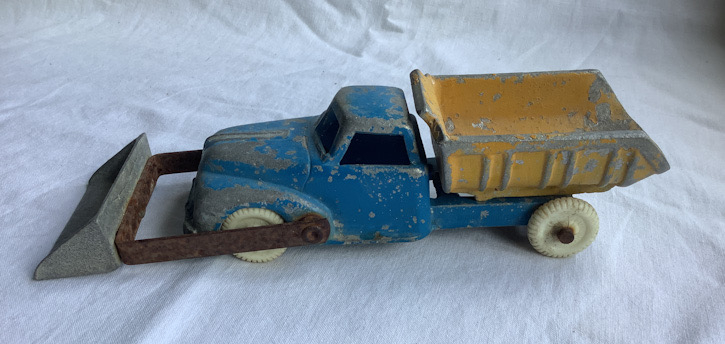vintage New Zealand metal Tip truck with shovel toy made by Fun Ho